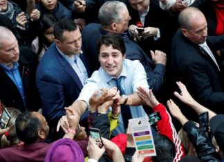 Justin Trudeau wins second term in hard-fought Canada election
