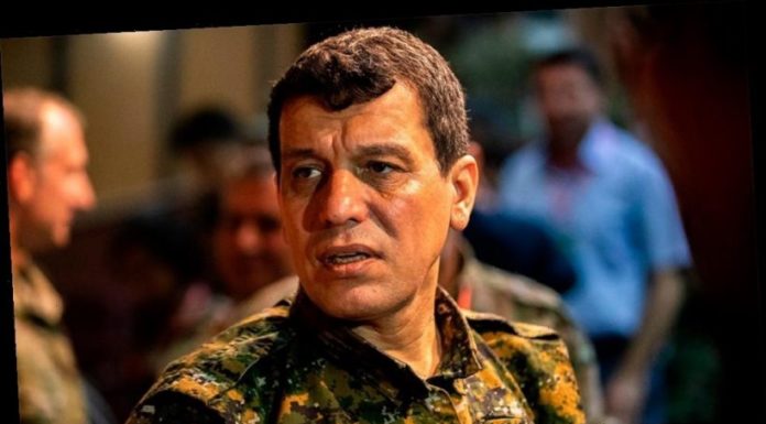 Kurdish military leader says his fighters still want to work with US, accuses Turkey of 'violating' cease-fire, 'ethnic cleansing'
