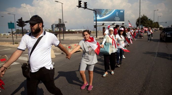 Lebanon protesters form human chain across the country
