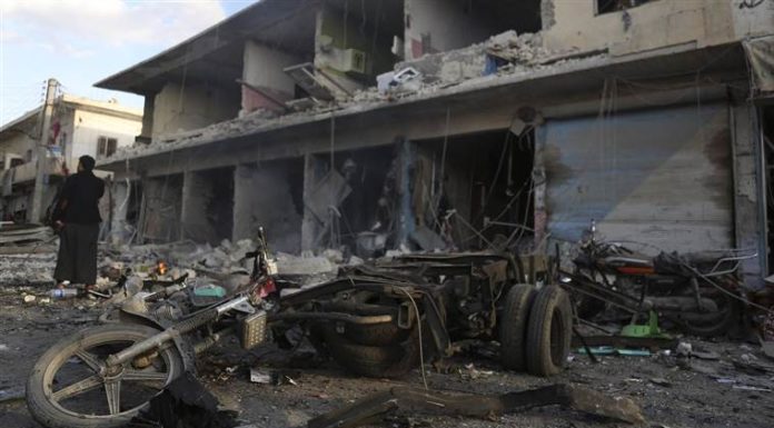Over a dozen killed in car bomb attack near Turkey-Syria border