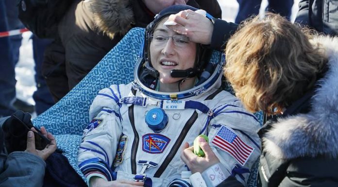Christina Koch returns to Earth after record 11-month stay aboard space station