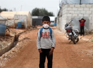 Fears mount as Syria reports first coronavirus case