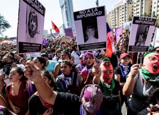 Feminist groups hold mass Women's Day marches across Chile