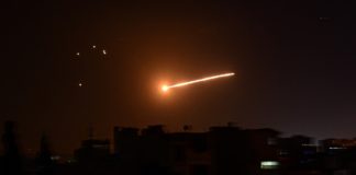 Syria air defences down Israeli missiles over Homs: state media
