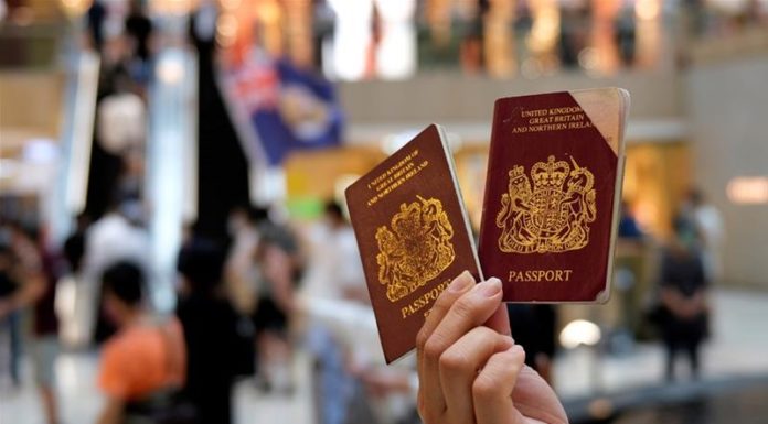 UK details route to citizenship for HK people drawing China anger