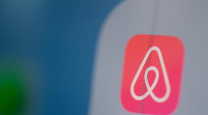 Airbnb's IPO soars, clinching a valuation of $100 billion
