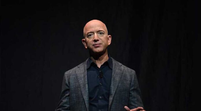 Jeff Bezos hits wealth record of $211 billion