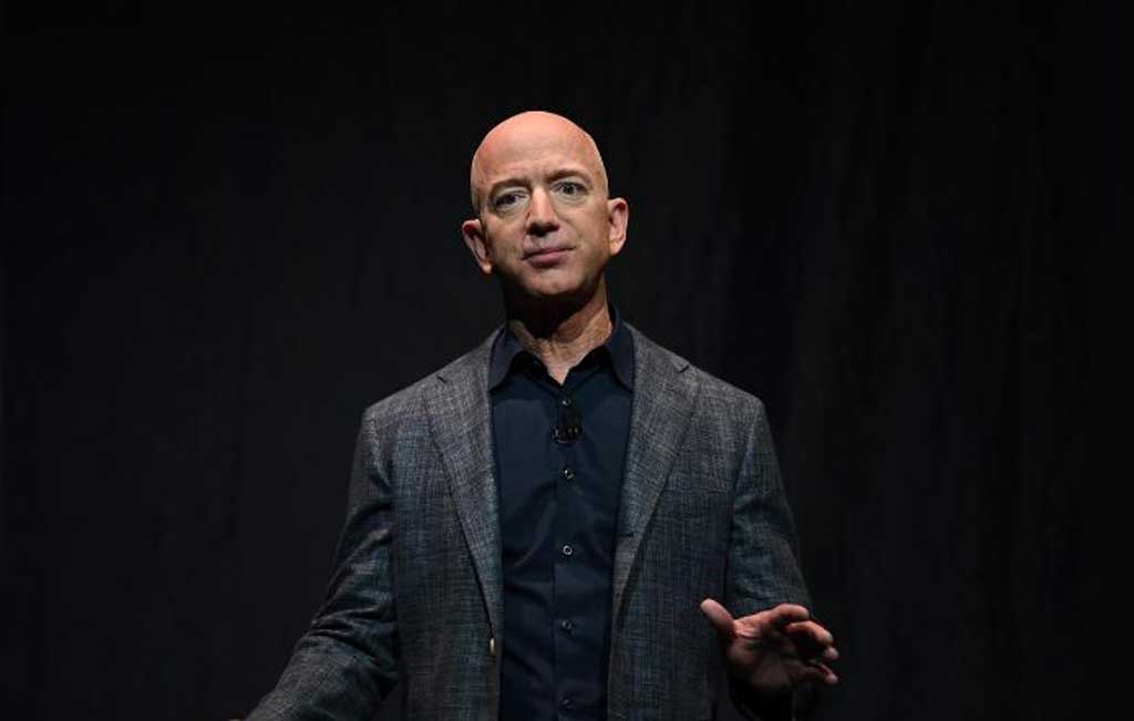 Jeff Bezos hits wealth record of $211 billion